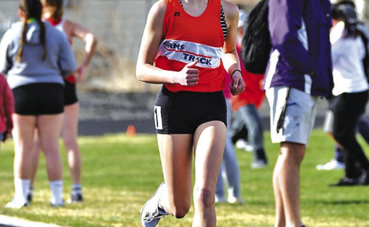 Photo by Melissa Grover Seventh grader Brittney Dehning set the Middle School record in the 1600 meter race with a time of 6:27.02 during the Western Trails Conference Invitational. Dehning’s time was also a meet record for the age group.
